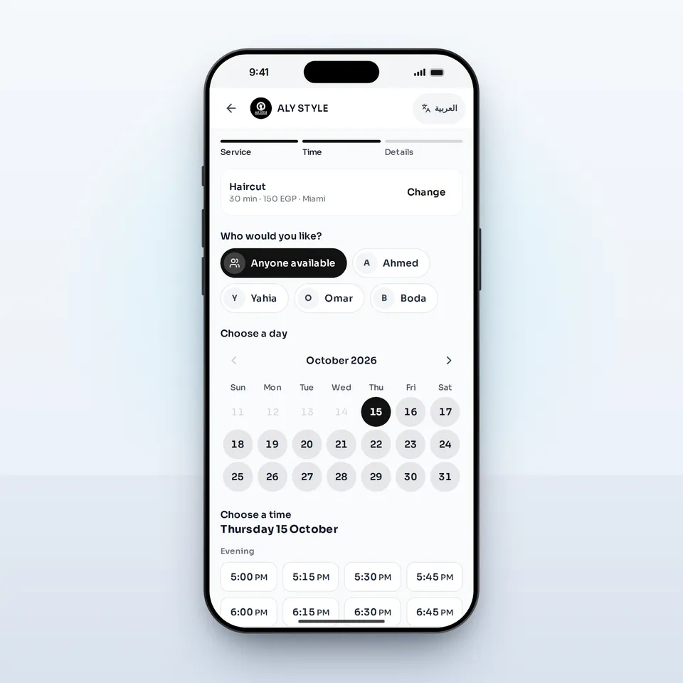 ALY STYLE's booking page on an iPhone showing the barbers, a calendar and free times