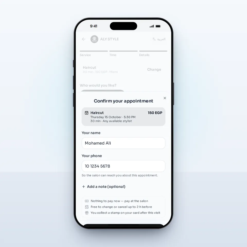 The ALY STYLE booking confirmation on an iPhone